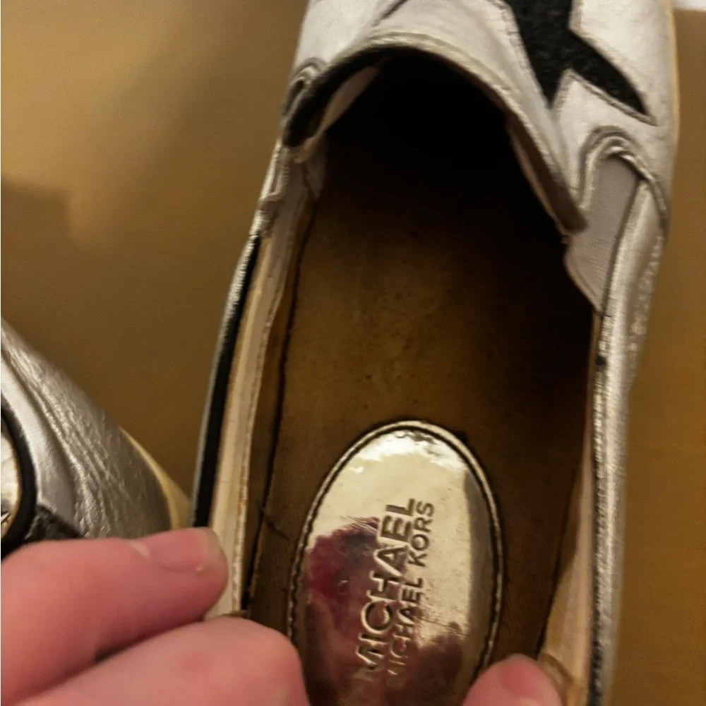 Michael Kors Silver Slip-On Shoes with Black Star Accents